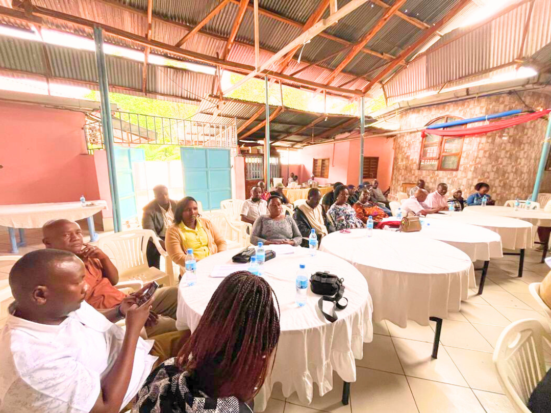 MACTF members in discussion at a meeting